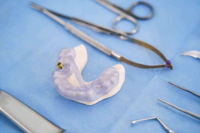 teeth model with metal implant and dental tools 2022 03 31 17 41 56 utc 2 1